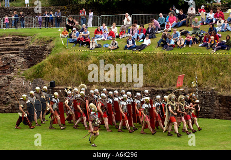 Ermine Street Guard give a display of fighting skills in the Roman Amphitheatre at Caerleon near Newport Gwent Wales UK Stock Photo