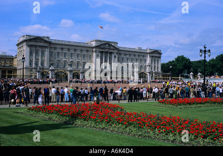 Crowds of tourists watching the Changing of the Guard at Buckingham Palace London UK Stock Photo