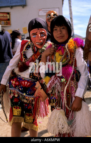 Traditionally dressed dancers at the Virgen del Carmen festival in the Sacred Valley- Peru Stock Photo