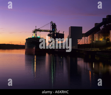 An ore carrier ship loads at Alcan in Port of Blyth Northumberland Stock Photo