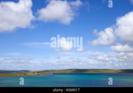 dh Burra Sound HOY ORKNEY Graemsay island sea blue sky white fluffy clouds puffy cloud