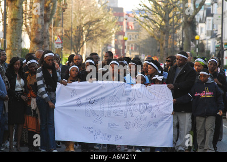 Family and friends of Kodjo Yenga walking down Hammersmith Grove west London in memory of the murdered schoolboy Stock Photo