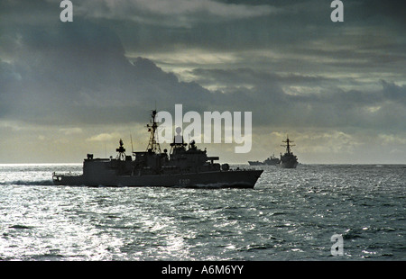 Nato co-operation warships from the German, UK and USA, the German frigate Bremen in  company with USS Barry and HMS Edinburgh Stock Photo