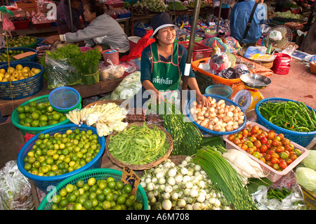 THAILAND CHIANG MAI Woman selling vegetables at outdoor market Stock Photo
