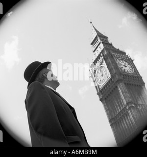 City gent businessman looking at Big Ben clocktower in London, England. Stock Photo