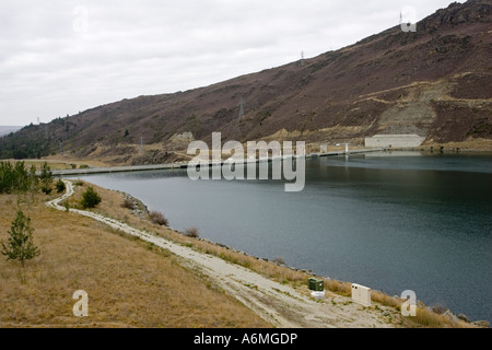 Upper section of Clyde hydroelectric dam and Lake Dunstan on Clutha River South Island New Zealand Stock Photo