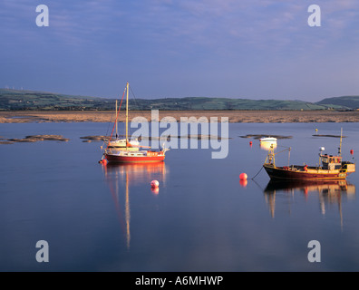 BOATS on River Dovey Afon Dyfi estuary in evening sun at low tide Aberdovey Aberdyfi Gwynedd Mid Wales UK Stock Photo