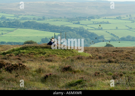 Shooters or guns waiting for grouse on the north york moors Stock Photo