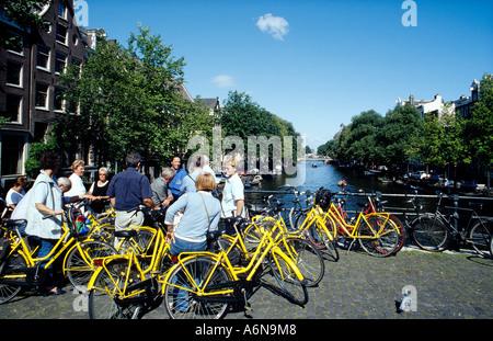 Guided tour on rental bikes around Amsterdam Stock Photo