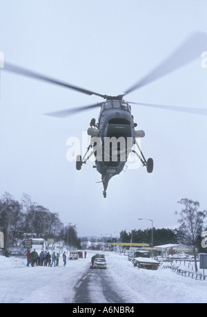 Westland Wessex SAR Helicopter landing on A9 main road in Aviemore Inverness-shire.   GAV 2265-236 Stock Photo