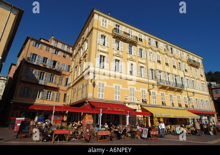 People sitting outside bars in Nice, France Stock Photo