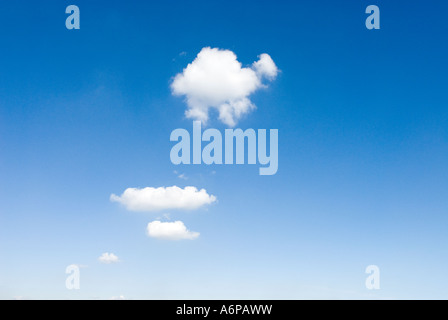 one single white soft fluffy cloud in blue sky Stock Photo