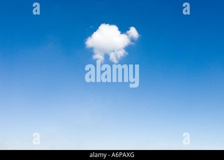 one single white soft fluffy cloud in blue sky shaped like an animal Stock Photo