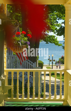 USA Michigan Lake Huron Mackinac Island front porches of homes along Market Street Stock Photo