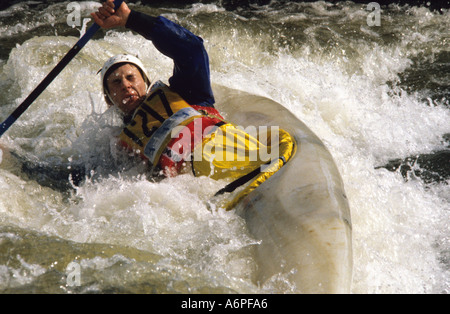 slalom canoist in canoe on white water course at the national watersport centre nottingham uk Stock Photo