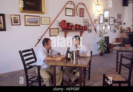 two winemakers in the tasting hall of a winery in Spain Stock Photo