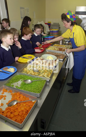 Children queue up for school dinners UK Stock Photo