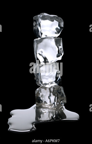 STACK OF ICE CUBES MELTING CUT OUT ON BLACK BACKGROUND Stock Photo
