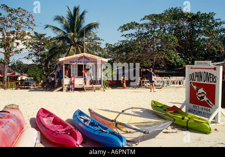 Canoes On Negril Beach Jamaica Caribbean Stock Photo