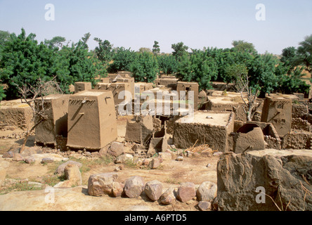 Traditional adobe, mud--brick houses and granaries in a Dogon village at the foot of the Bandiagara Escarpment. Kani Kambole. Mali Stock Photo