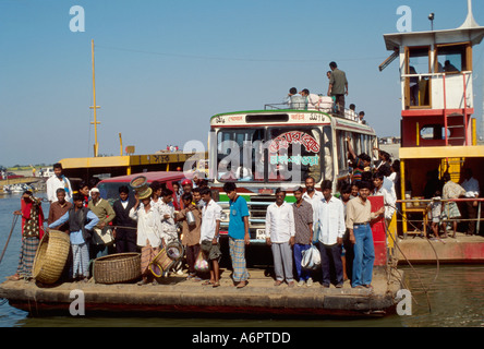 Passenger and vehicle ferry on the River Padma landing near Faridpur, Bangladesh. Stock Photo