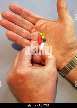 Handful of Pills Stock Photo