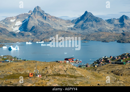 Kong Oscars Havn and the village of Tasiilaq, formerly known as Ammassalik, Angmagssalik Island, Sermilik Fjord, East Greenland Stock Photo