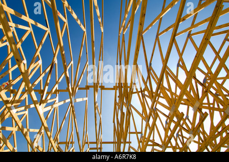 wooden beams on new home under construction Stock Photo