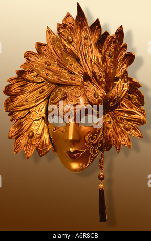 Venetian carnival papier mâché papier mache mask of Gold head Stock Photo