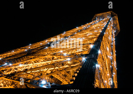 Flashing strobes every hour on the hour for ten 10 minutes after eight in the evening Eiffel Tower Paris France Europe Stock Photo