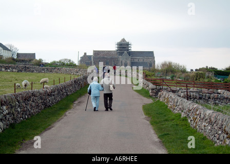 Pilgrims on the way to Iona Abbey Scotland Argyll and Bute Travel Scotland Island Isle Isle of Mull Inner Hebrides Stock Photo