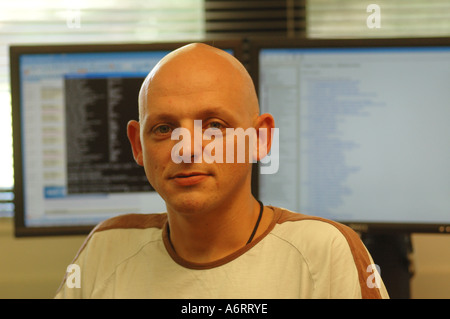 Young computer geek in software design office Stock Photo