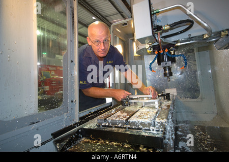 portrait of worker with milling machine Stock Photo