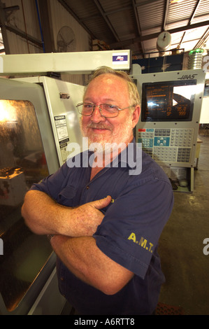mature worker in metal workshop Stock Photo