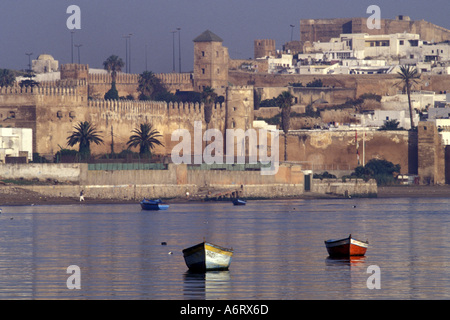 Africa, Morocco, Rabat, Fishing boats in Oued Bou Regreg (river); Kasbah des Oudaias in background (17th c.) Stock Photo