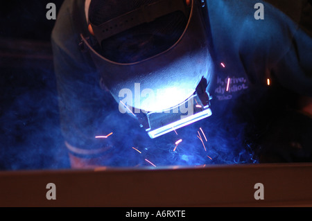 welder in metal workshop Stock Photo
