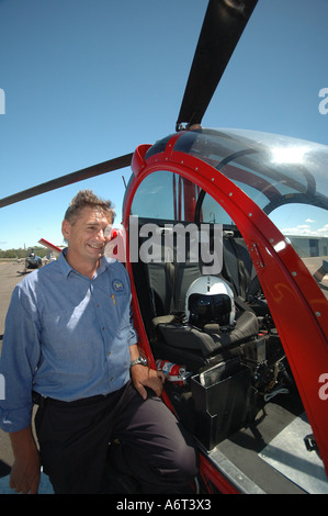 chopper pilot performing pre flight checks Stock Photo