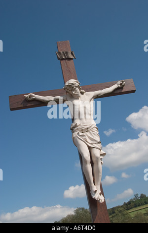 Christ on cross in French church cemetery near Autun France Stock Photo