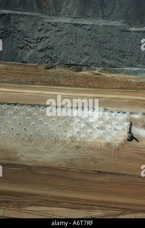 Aerial view of drag line at Central Queensland coal mine drill holes for explosives Stock Photo