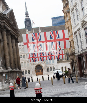 Union Flags and Cross of Saint George flags outside Guildhall, City of London, GB UK Stock Photo