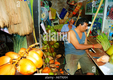 Mauritius Island Man working inside a bus Stock Photo: 16579439 - Alamy