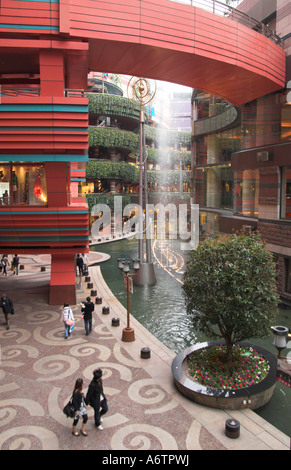 Japan Kyushu Fukuoka Hakata Canal City S shaped shopping Mall and entertainment complex with artificial canal and fountains Divi Stock Photo