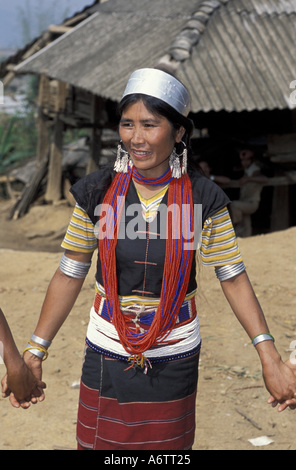 China, Yunnan Province, Simao Region. Wa minority woman, in traditional dress, dances. Stock Photo