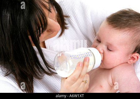 Mother Feeding Baby Models Released Stock Photo