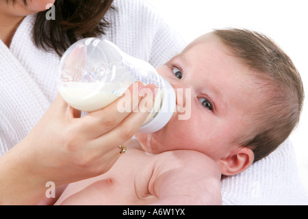 Mother Feeding Baby Models Released Stock Photo