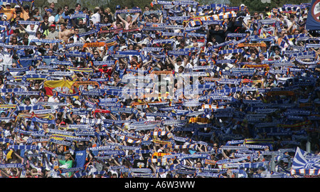 Fans of Karlsruher SC cheer for their club in the Wildparkstadium. Karlsruhe, Baden-Wuerttemberg, Germany Stock Photo