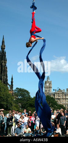 Female trapeze artist performing at the Edinburgh Fringe Festival Scotland UK 2004 Stock Photo