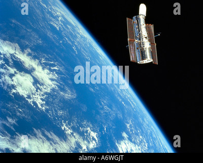 NASA Hubble Space Telescope in orbit above the earth Stock Photo