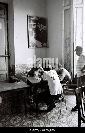 Men playing chess in chess club in Santiago de Cuba . Stock Photo