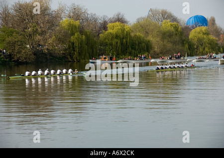 The Oxford Cambridge Boat Race moving upstream near Barnes Bridge at speed Stock Photo